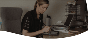 Speech Pathologist supporting a participant with communication and language development.